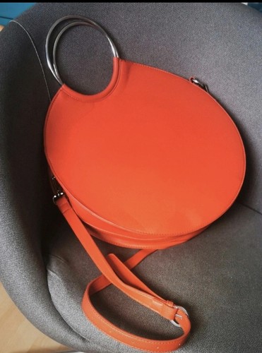 Burnt orange round hand - hand, bag