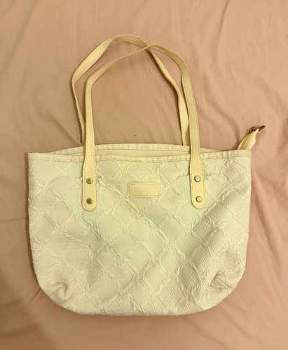 White bag with gold details